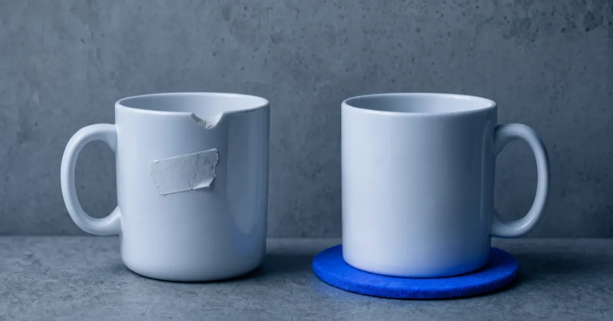 Two identical mugs, one chipped and one well presented, comparing a cheap website with a cheap-looking website